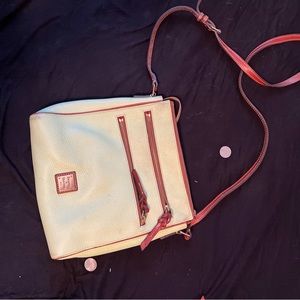Dooney & Bourke Cream Pebble Leather Crossbody Bag.